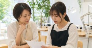 高崎のネイルスクール申込に向けて必要書類や準備を確認する女性